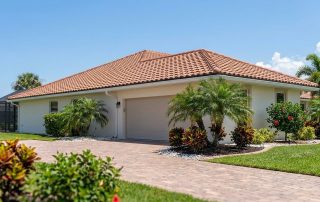 Concrete barrel tile roof on a single story Fort Myers home after a full roof replacement in Lee County